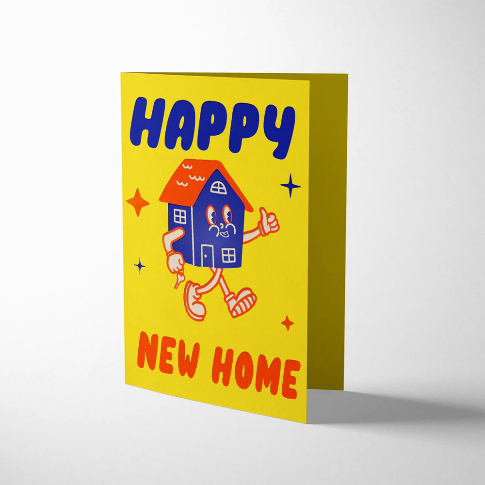 Greeting card with a cartoon house character and 'Happy New Home' text on a yellow background
