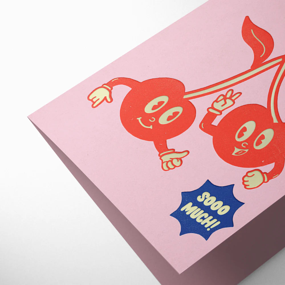 Pink card with red cartoon characters and 'SOOO MUCH!' text on a white background