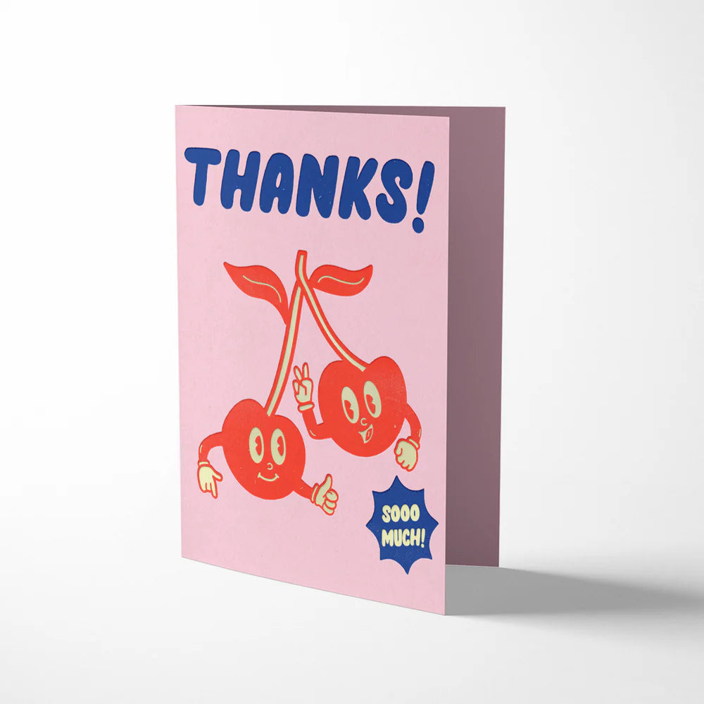 Pink greeting card with cartoon cherries and 'THANKS!' text on a white background