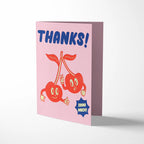 Pink greeting card with cartoon cherries and 'THANKS!' text on a white background
