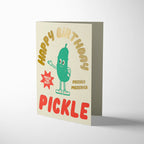 Birthday card with a pickle illustration and text on a white background