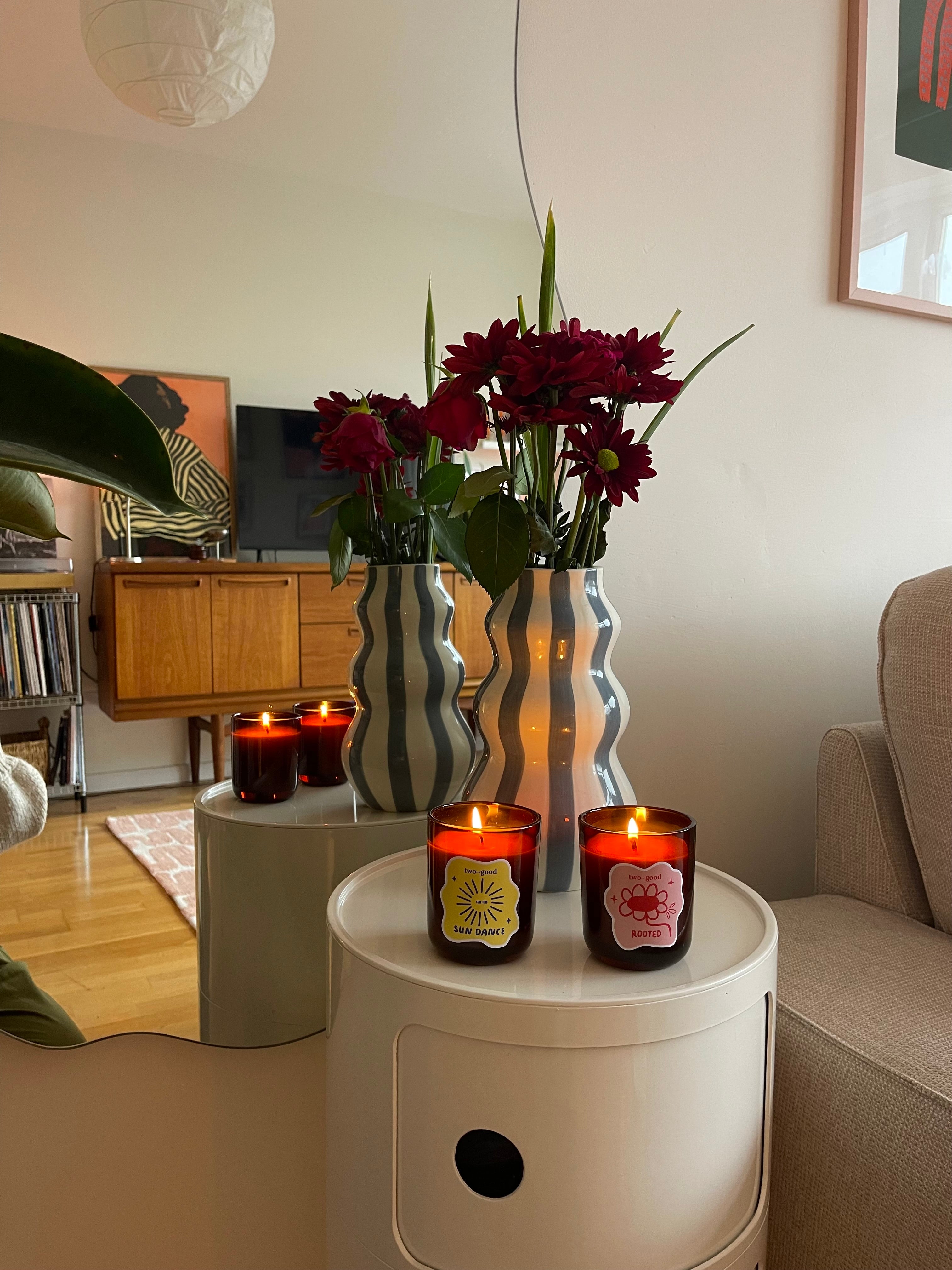 Rooted earthy scented candle styled with decorative homeware