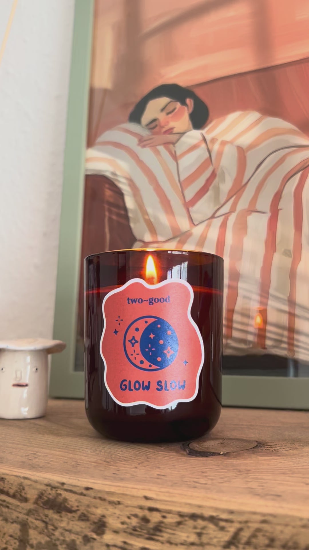 Glow Slow autumn candle styled with homeware