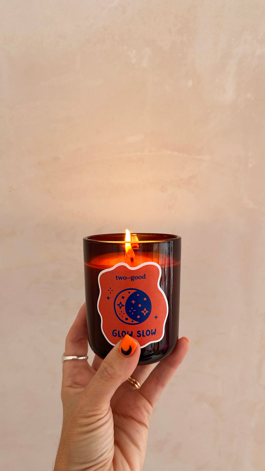 two~good Glow Slow soy wax candle with citrus and clove fragrance